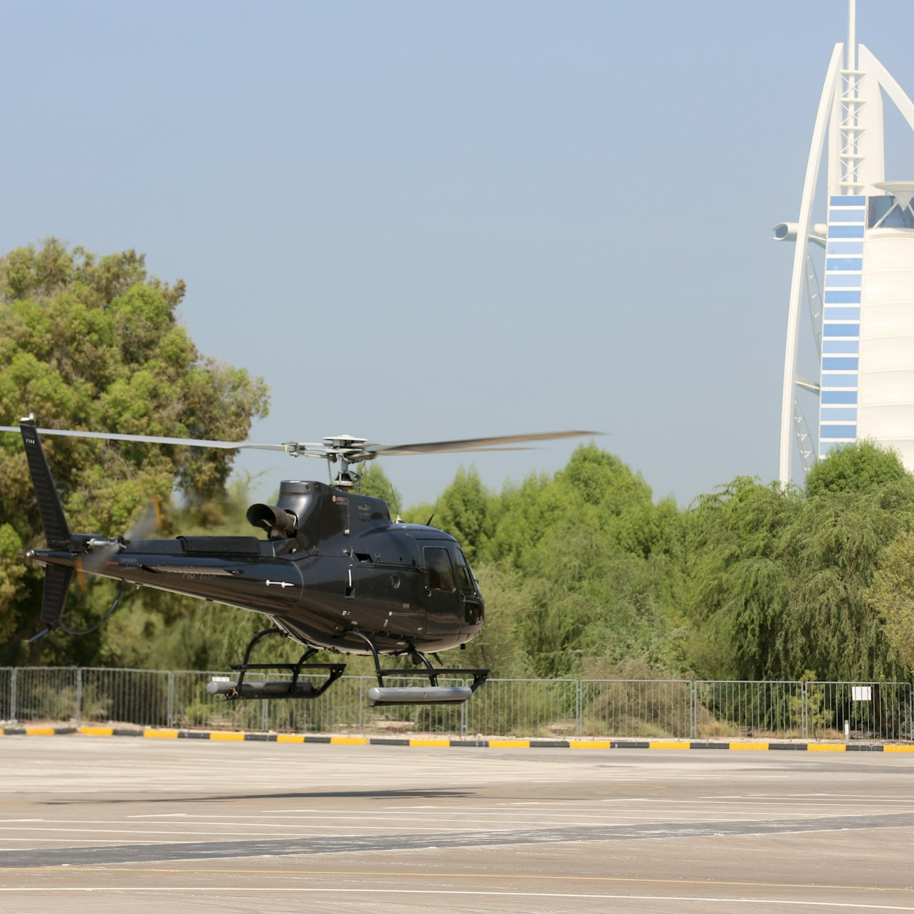 Experience the stunning views of Dubai from above flying past iconic landmarks like the Burj Khalifa and Palm Jumeirah on an unforgettable aerial adventure.